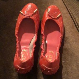 Tod’s pink patent leather flats